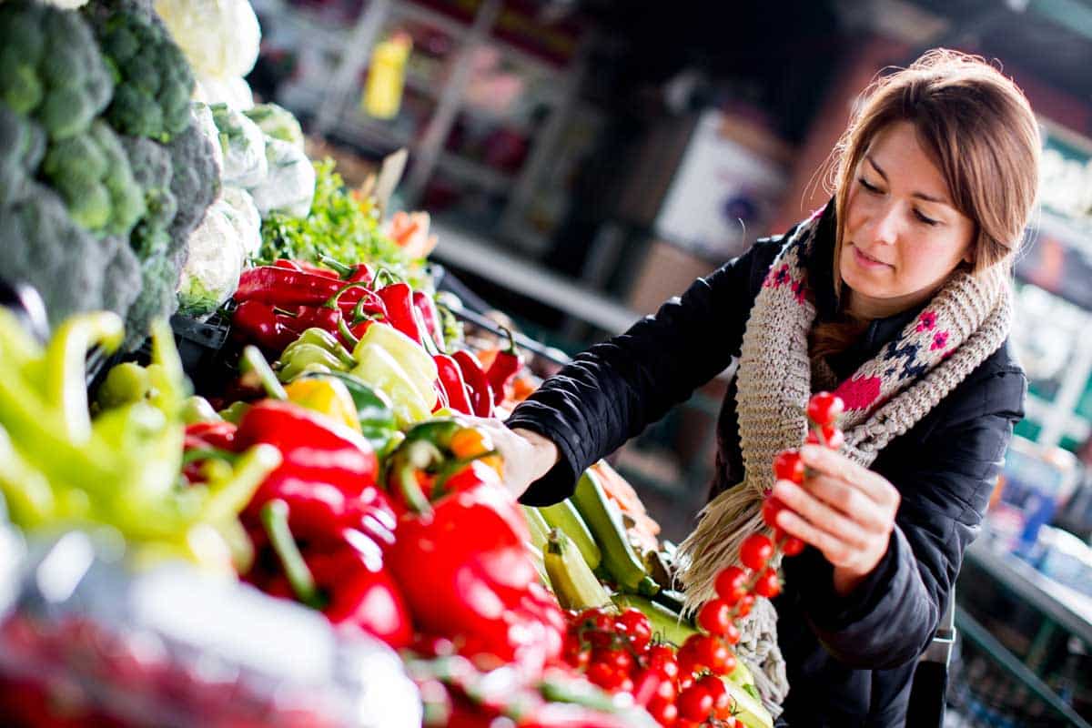 Woman Shopping for Peruvian Peppers